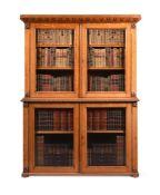 A WILLIAM IV OAK CABINET BOOKCASE, IN THE MANNER OF GEORGE BULLOCK, FIRST HALF 19TH CENTURY