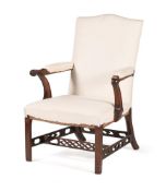 A GEORGE III MAHOGANY ARMCHAIR, IN THE MANNER OF THOMAS CHIPPENDALE, CIRCA 1780