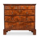 A QUEEN ANNE BURR WALNUT AND FIGURED WALNUT CHEST OF DRAWERS, CIRCA 1710