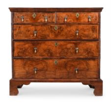 A QUEEN ANNE BURR WALNUT AND FIGURED WALNUT CHEST OF DRAWERS, CIRCA 1710