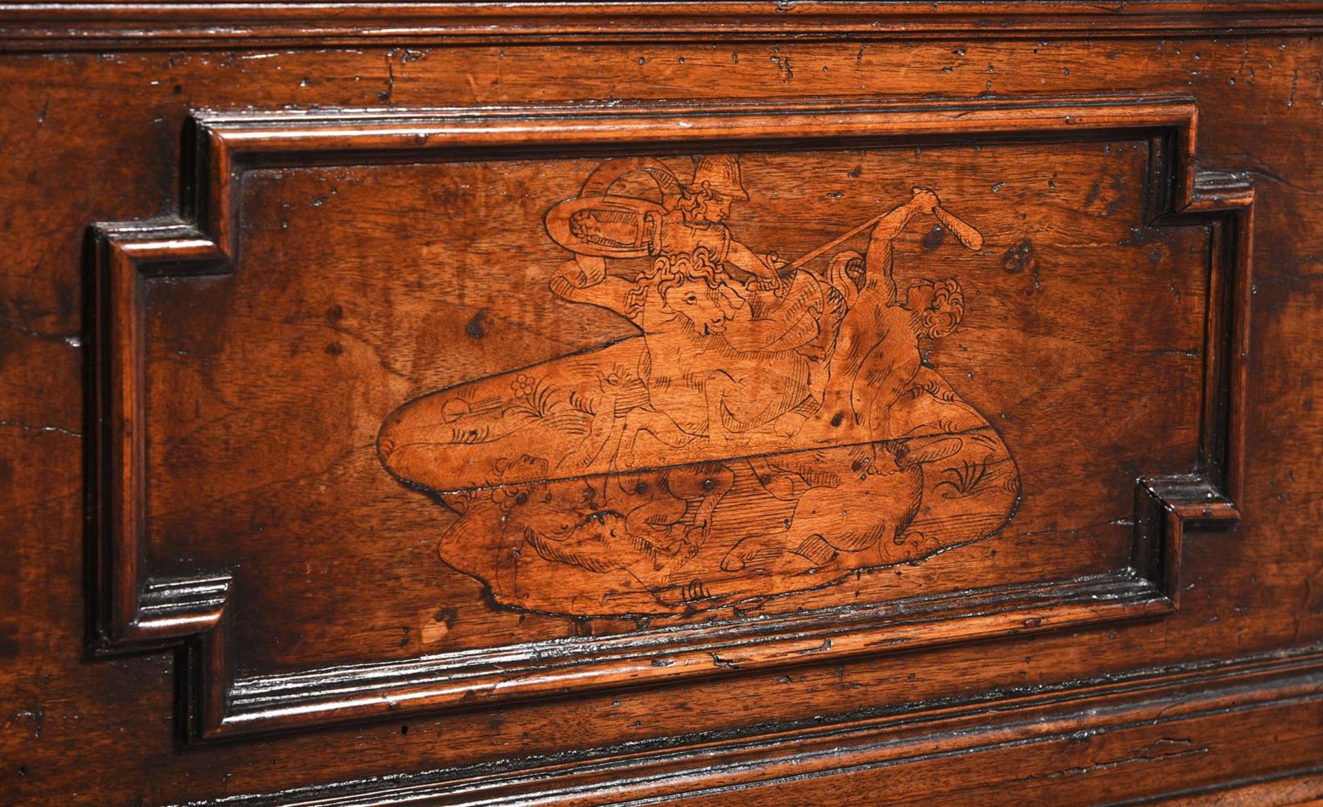AN ITALIAN CARVED WALNUT AND INLAID CASSONE, EARLY 17TH CENTURY AND LATER ELEMENTS - Image 8 of 8