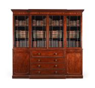 A GEORGE IV MAHOGANY BREAKFRONT LIBRARY BOOKCASE, OF ROYAL INTEREST, CIRCA 1825