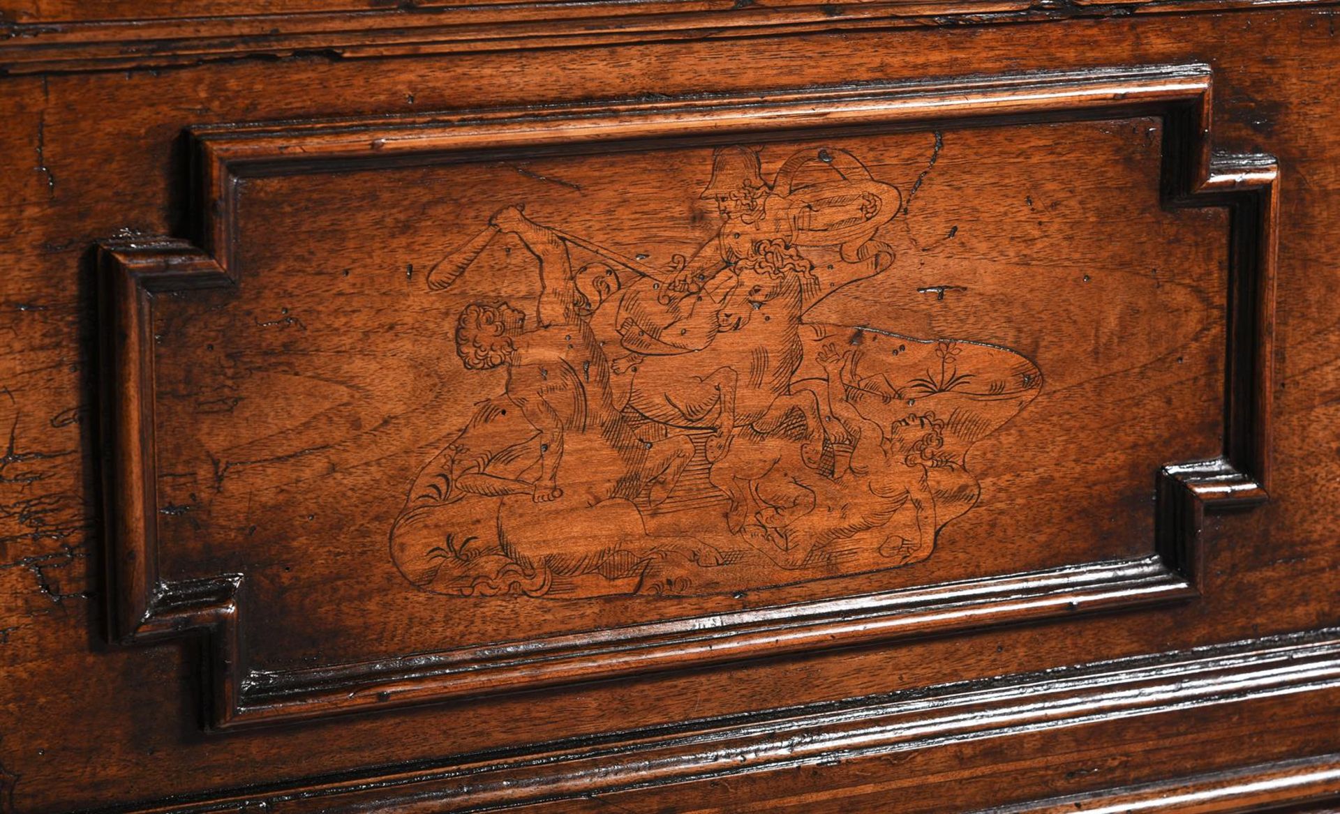 AN ITALIAN CARVED WALNUT AND INLAID CASSONE, EARLY 17TH CENTURY AND LATER ELEMENTS - Image 7 of 8