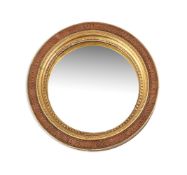 A GEORGE III GILTWOOD AND QUILL-WORK DECORATED CONVEX MIRROR, CIRCA 1800