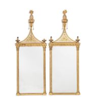 A PAIR OF GILTWOOD AND VERRE EGLOMISE MIRRORS, IN REGENCY STYLE, 20TH CENTURY