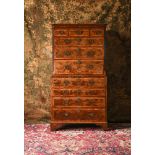 A GEORGE II BURR WALNUT AND WALNUT SECRETAIRE CHEST ON CHEST, CIRCA 1735