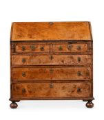 A GEORGE I BURR WALNUT, WALNUT AND FEATHER BANDED BUREAU, CIRCA 1720