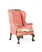 A GEORGE II WALNUT WING ARMCHAIR, CIRCA 1740