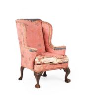 A GEORGE II WALNUT WING ARMCHAIR, CIRCA 1740