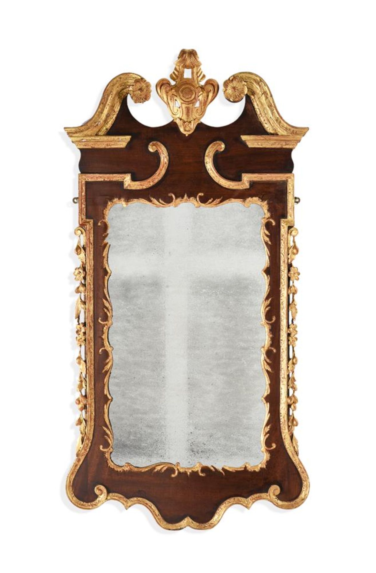 A GEORGE II MAHOGANY AND PARCEL GILT WALL MIRROR, CIRCA 1740