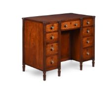 A REGENCY MAHOGANY AND LINE INLAID DESK OR DRESSING TABLE, CIRCA 1815