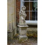 A CARVED VICENZA STONE PUTTI ON A BASE, 19TH CENTURY