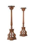 A PAIR OF REGENCY CARVED PINE TORCHERES, EARLY 19TH CENTURY