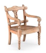 A 'RUSTIC' OAK ARMCHAIR, 19TH OR EARLY 20TH CENTURY