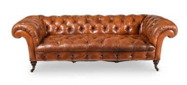 A VICTORIAN WALNUT AND LEATHER UPHOLSTERED CHESTERFIELD SOFA, BY HOWARD & SONS, LATE 19TH CENTURY