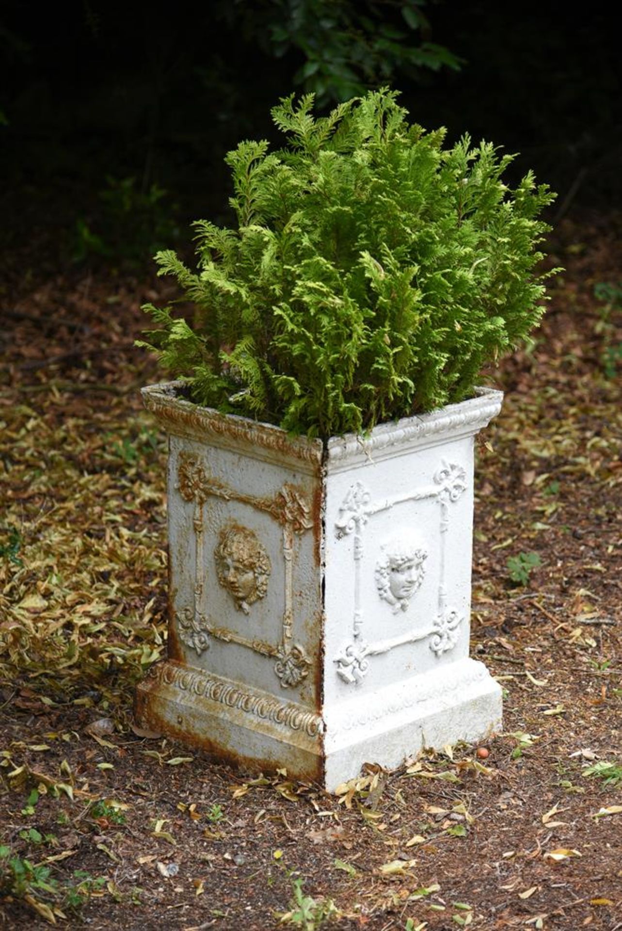 A WHITE PAINTED CAST IRON GARDEN PLANTER, 19TH CENTURY