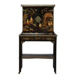 A BLACK LACQUER GILT CHINOISERIE DECORATED, AND GILT METAL MOUNTED CABINET ON STAND, MID19TH CENTURY