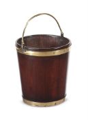 AN IRISH GEORGE III MAHOGANY AND BRASS BOUND PEAT BUCKET, CIRCA 1770