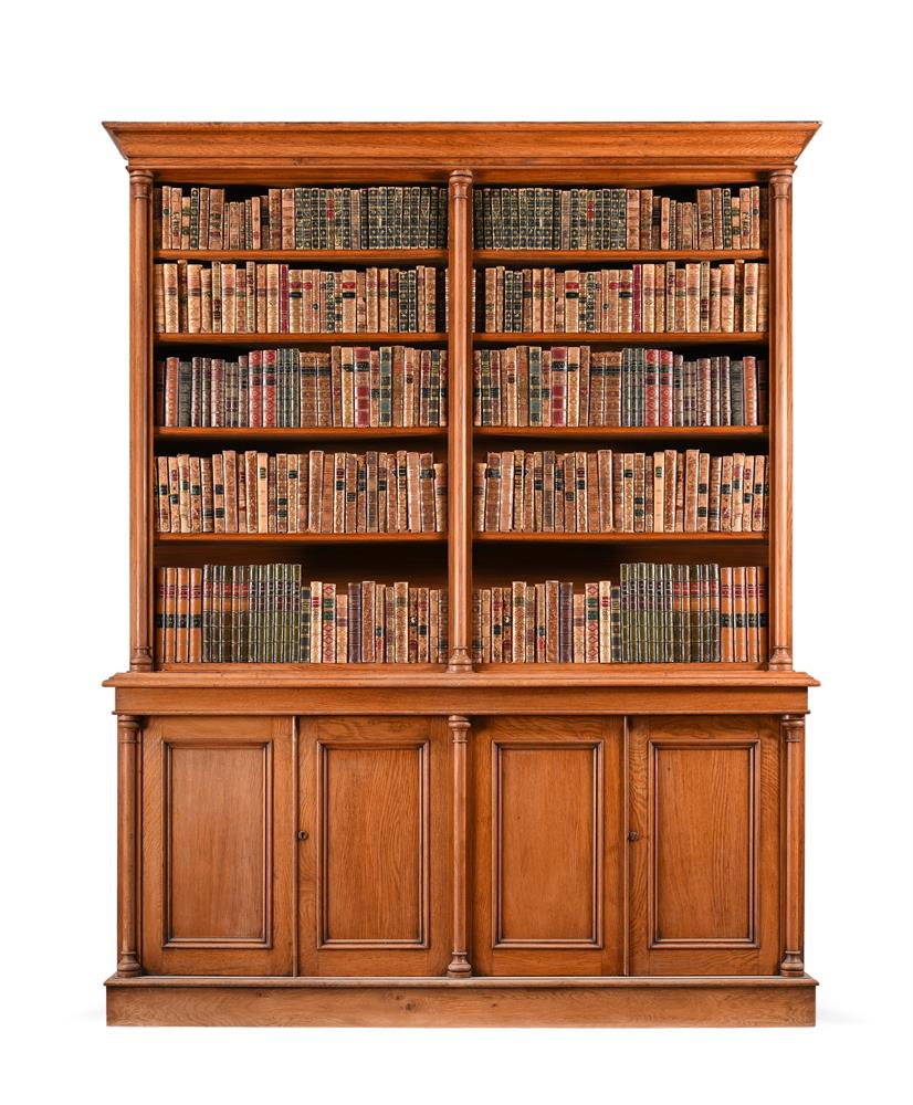 A VICTORIAN OAK LIBRARY BOOKCASE, LATE 19TH CENTURY