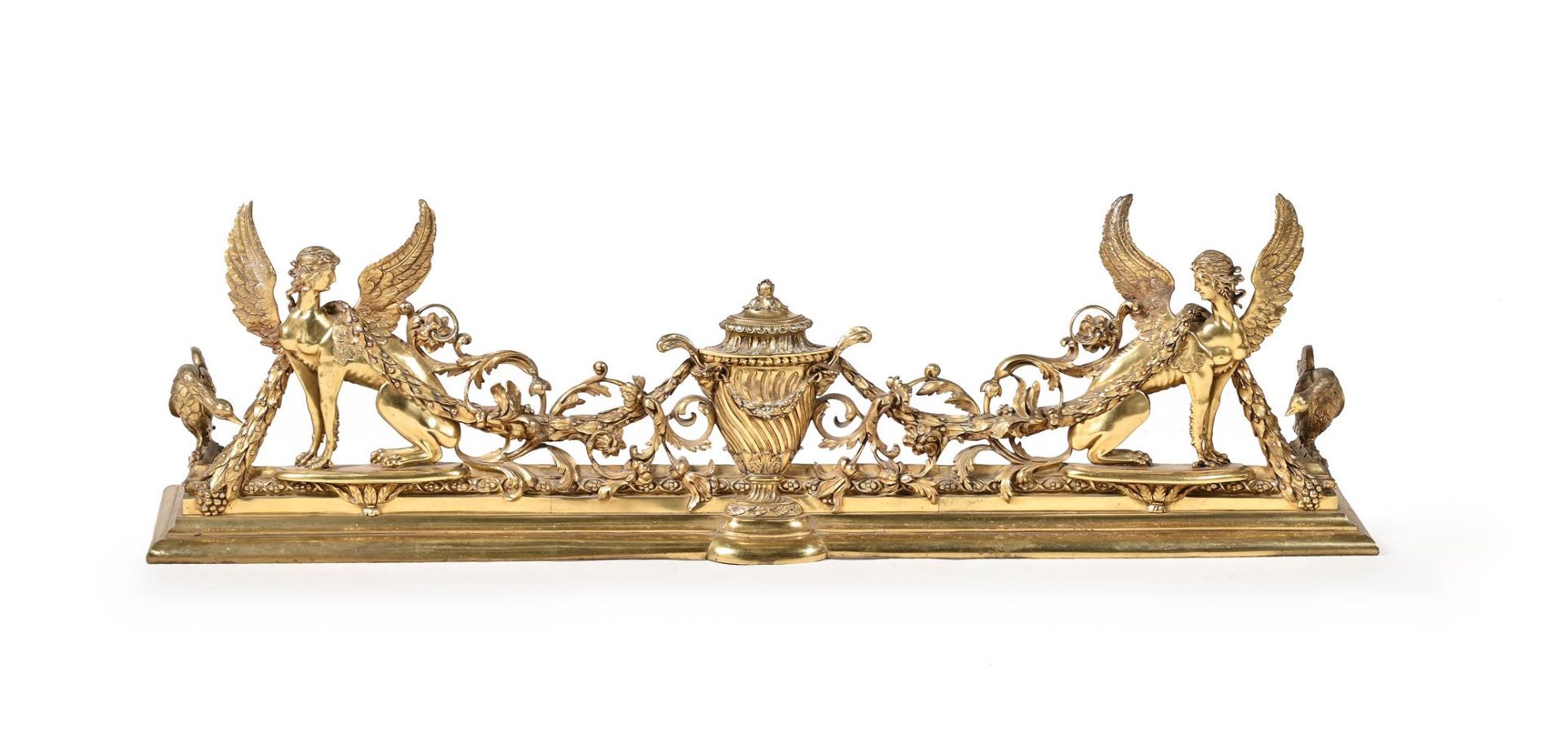 A SUBSTANTIAL BRASS FIRE FENDER, LATE 19TH OR EARLY 20TH CENTURY