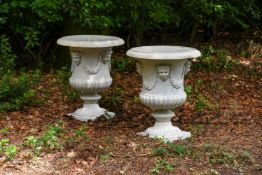 A LARGE PAIR OF FRENCH CAST IRON URNS, IN THE MANNER OF THE VAL D'OSNE FOUNDRY, LATE 19TH CENTURY