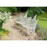 TWO WEATHERED CAST IRON GARDEN BENCHES, 20TH CENTURY