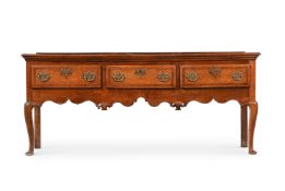 A GEORGE II OAK AND WALNUT CROSSBANDED DRESSER BASE, MID 18TH CENTURY