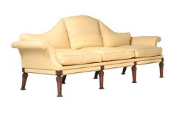 A LARGE BEECH AND UPHOLSTERED SOFA, AFTER A DESIGN ATTRIBUTED TO WILLIAM KENT, MODERN