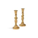 A PAIR OF FRENCH GILT BRONZE CANDLESTICKS, IN THE MANNER OF HENRI DASSON, LATE 19TH CENTURY