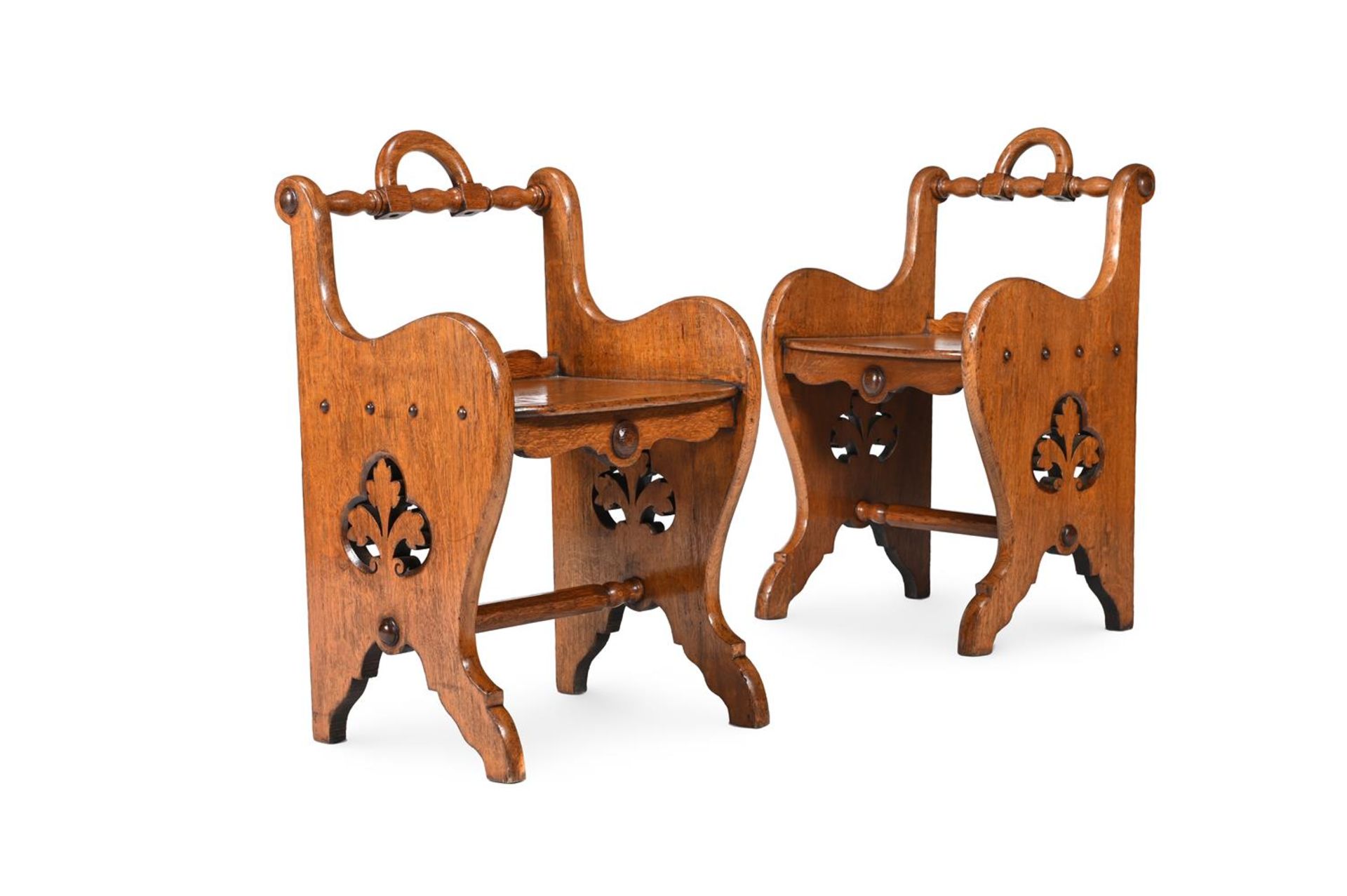 A PAIR OF EARLY VICTORIAN OAK STOOLS, MID 19TH CENTURY