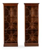 A PAIR OF VICTORIAN MAHOGANY BOOKCASES, BY HOWARD & SONS, IN GEORGE III STYLE, CIRCA 1890