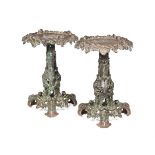 A PAIR OF CAST IRON GARDEN OR TERRACE TABLES, MODERN