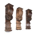 A SET OF THREE LARGE CARVED OAK BRACKETS, 19TH CENTURY