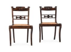 Y A PAIR OF CEYLONESE CARVED EBONY SIDE CHAIRS, SECOND QUARTER 19TH CENTURY