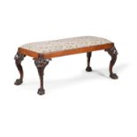 A CARVED MAHOGANY CENTRE OR WINDOW STOOL, IN GEORGE II STYLE, 20TH CENTURY