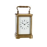 A FRENCH LACQUERED BRASS CORNICHE CASED CARRIAGE CLOCK