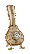 A FRENCH GILT BRASS AND ONYX NOVELTY STRUT TIMEPIECE IN THE FORM OF A MANDOLIN