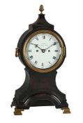 † A GEORGE III EBONISED BALLOON-SHAPED TABLE/BRACKET CLOCK WITH FIRED ENAMEL DIAL