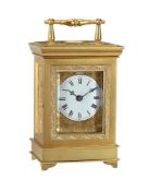 A FINE ENGLISH ENGRAVED GILT BRASS THREE-IN-TWO PETIT-SONNERIE STRIKING SMALL CARRIAGE CLOCK