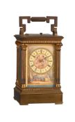 A FRENCH GILT BRASS ANGLAISE RICHE CASED REPEATING CARRIAGE CLOCK WITH PAINTED PORCELAIN DIAL PANEL