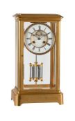 A FRENCH LARGE GILT BRASS FOUR-GLASS MANTEL CLOCK