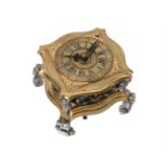 A PRUSSIAN GILT AND SILVERED BRASS HORIZONTAL TABLE CLOCK WITH PUSH-BUTTON REPEAT AND ALARM