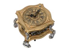 A PRUSSIAN GILT AND SILVERED BRASS HORIZONTAL TABLE CLOCK WITH PUSH-BUTTON REPEAT AND ALARM