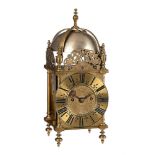 A BRASS QUARTER-STRIKING LANTERN CLOCK