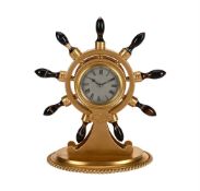 A LATE VICTORIAN GILT BRASS AND AGATE NOVELTY ‘SHIP’S WHEEL’ TIMEPIECE