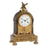 A FRENCH DIRECTOIRE PERIOD SMALL ORMOLU MANTEL CLOCK