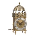 A FRENCH BRASS MID-SIZED LANTERN CLOCK