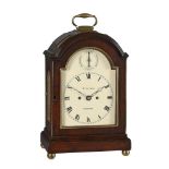 A GEORGE III BRASS MOUNTED FRUITWOOD TRIPLE-PAD-TOP TABLE CLOCK WITH TRIP-HOUR REPEAT