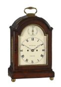 A GEORGE III BRASS MOUNTED FRUITWOOD TRIPLE-PAD-TOP TABLE CLOCK WITH TRIP-HOUR REPEAT