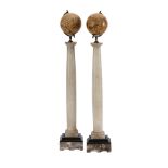 A PAIR OF DECORATIVE SMALL TABLE GLOBES ON ALABASTER AND MARBLE COLUMN STANDS